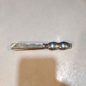 Antique mother of pearl nut cracker